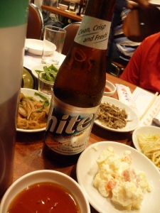 Hite beer with some of our complimentary small plates